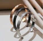 Pack of 2 Ayatul Kursi stainless steel cuff bangles engraved Islamic bracelets in silver and gold for men and women.