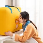 dinosaur-themed baby storage bag for toys, clothes, and nursery organization